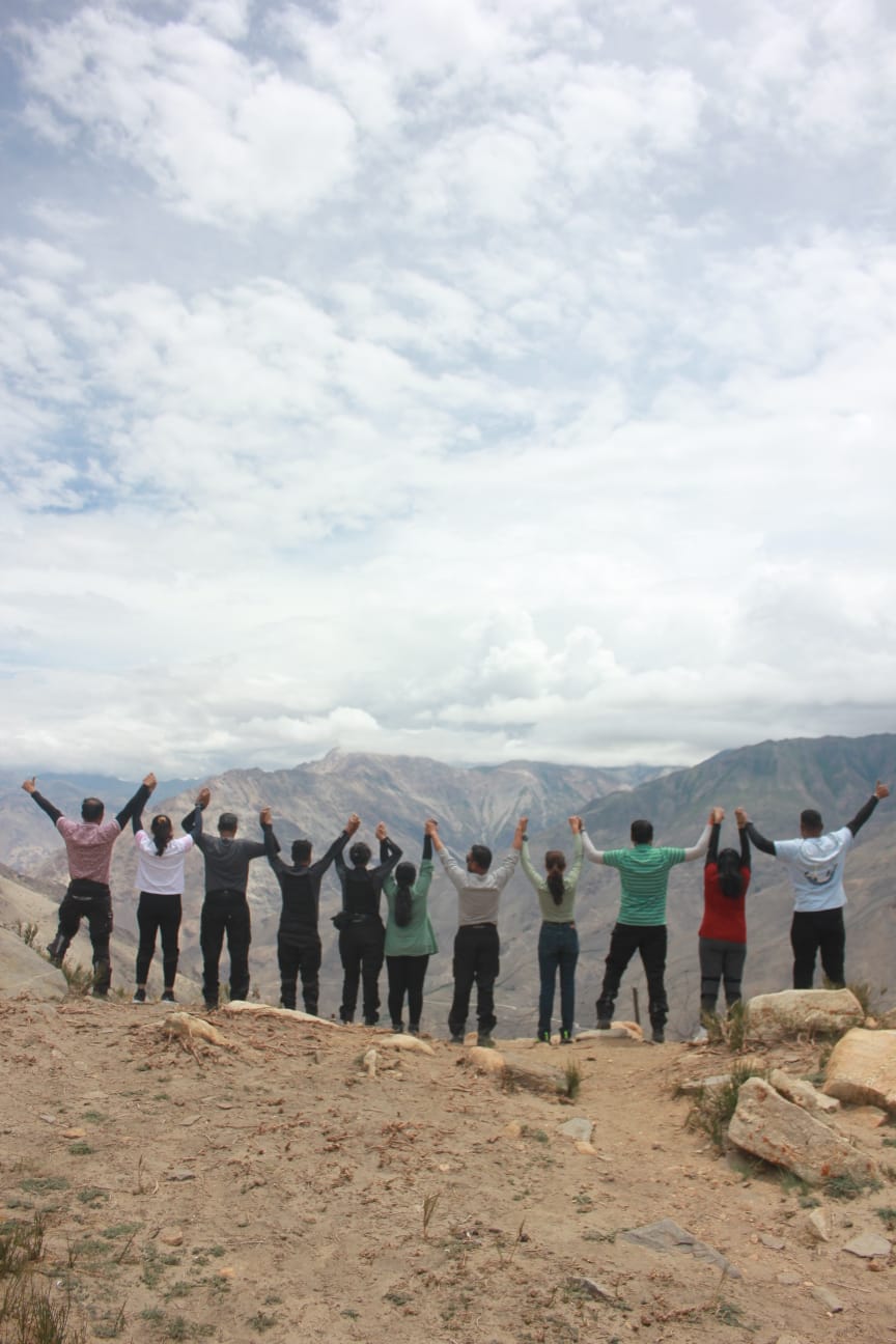 Group of riders at a Spiti Valley viewpoint